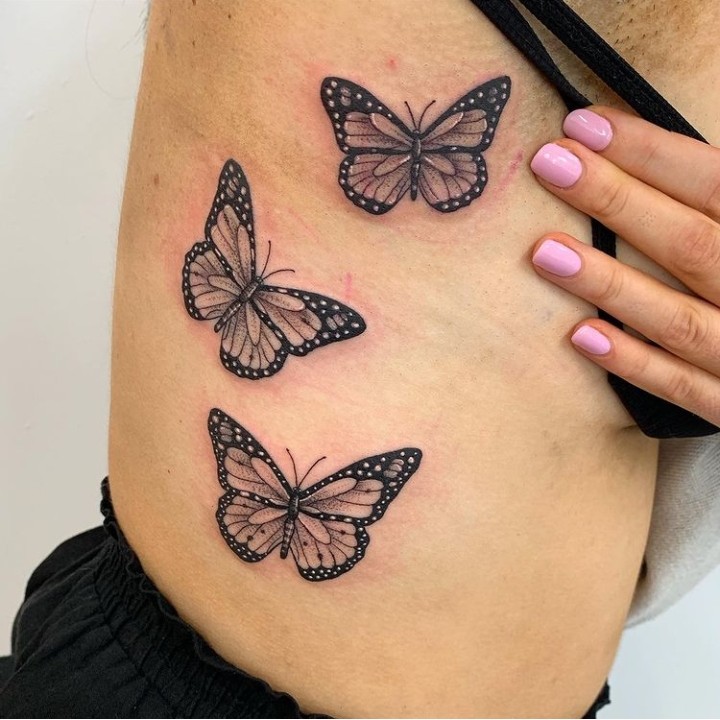 Tribal Breast Cancer Butterfly on Back Tattoo Idea